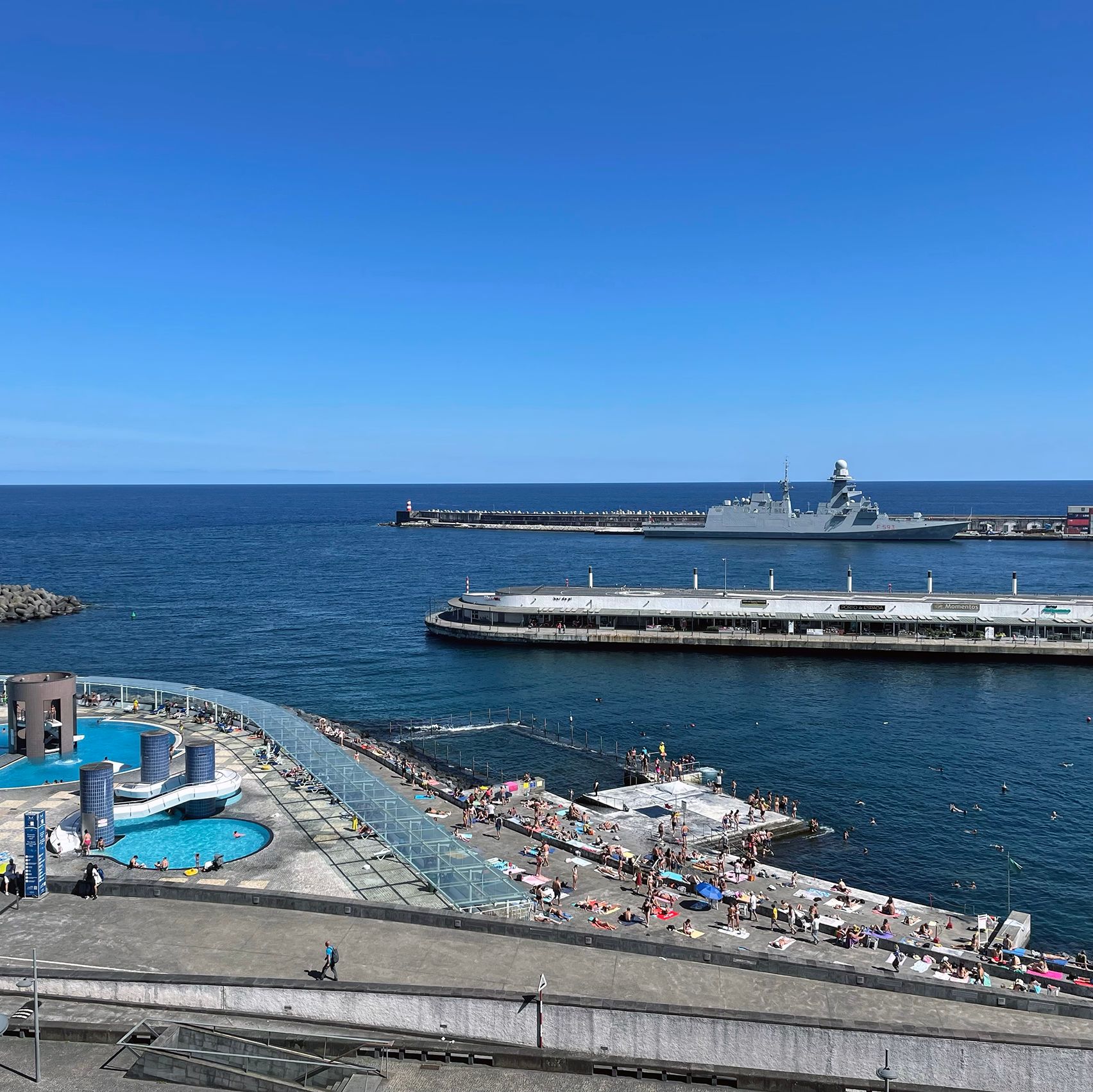 Industrial dock with sunbathers