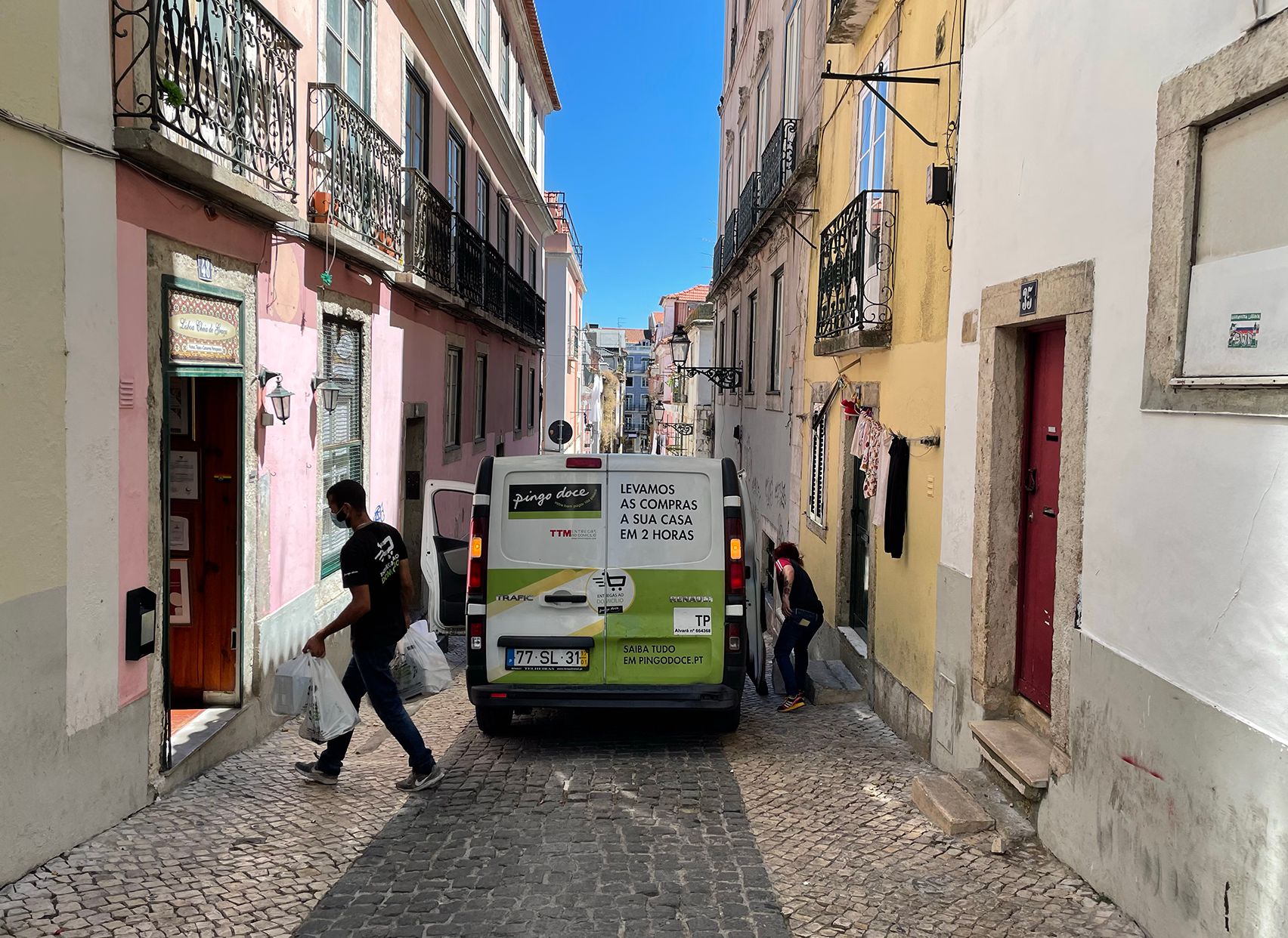 Street view with grocery delivery truck